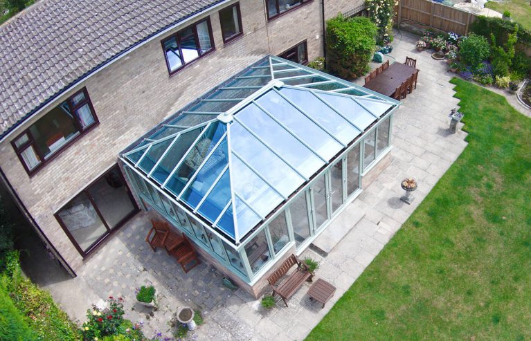 A large green uPVC conservatory